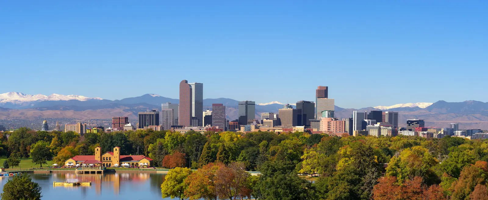 Denver skyline over City Park with the Front Range behind